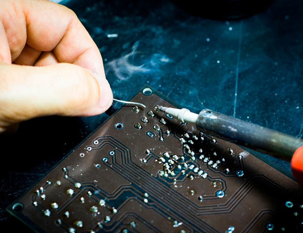 Infotech expert repairing Laptop