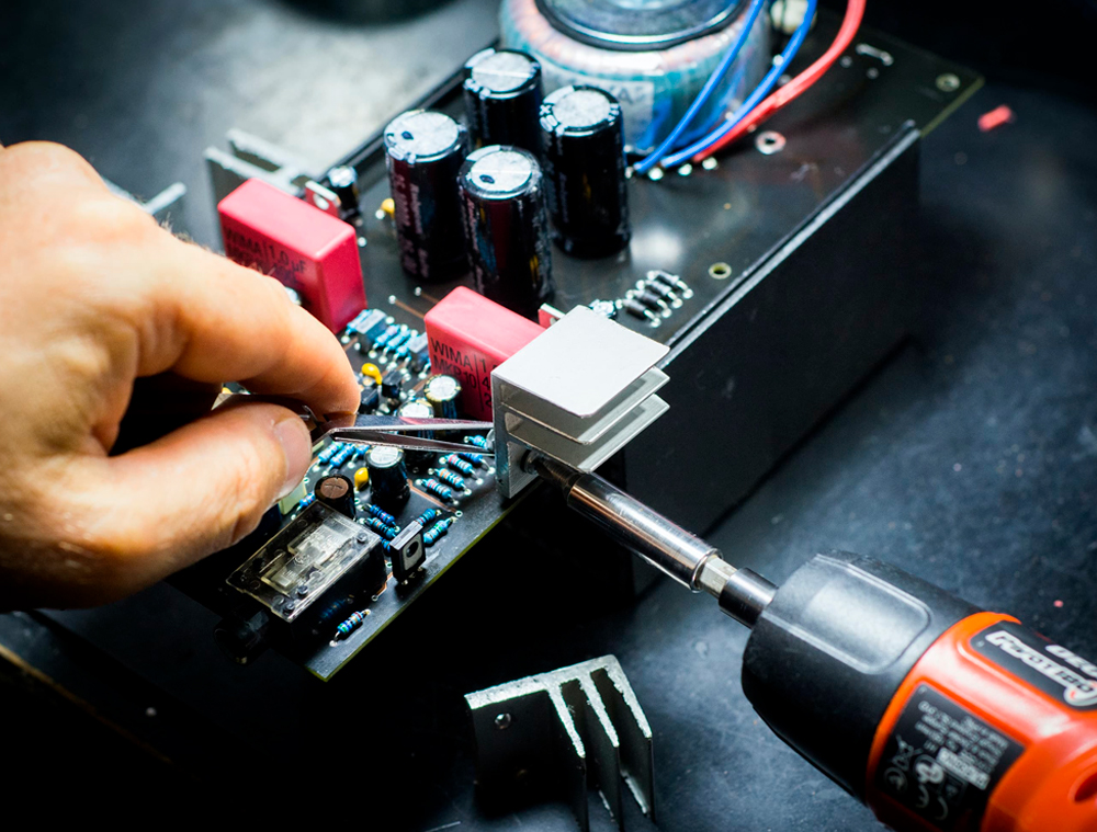 Infotech expert repairing Laptop