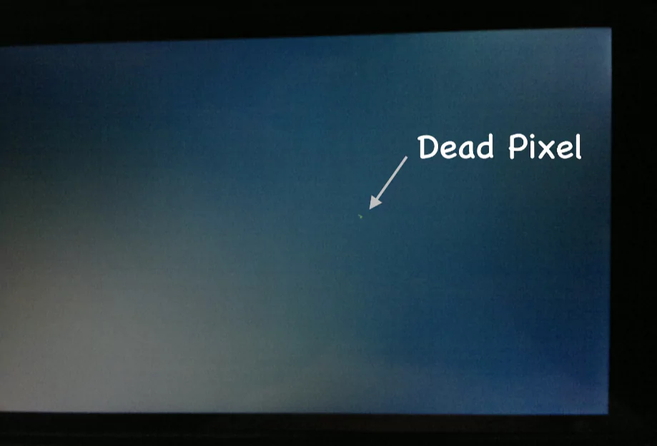 Close-up view of a dead pixel on a laptop screen
